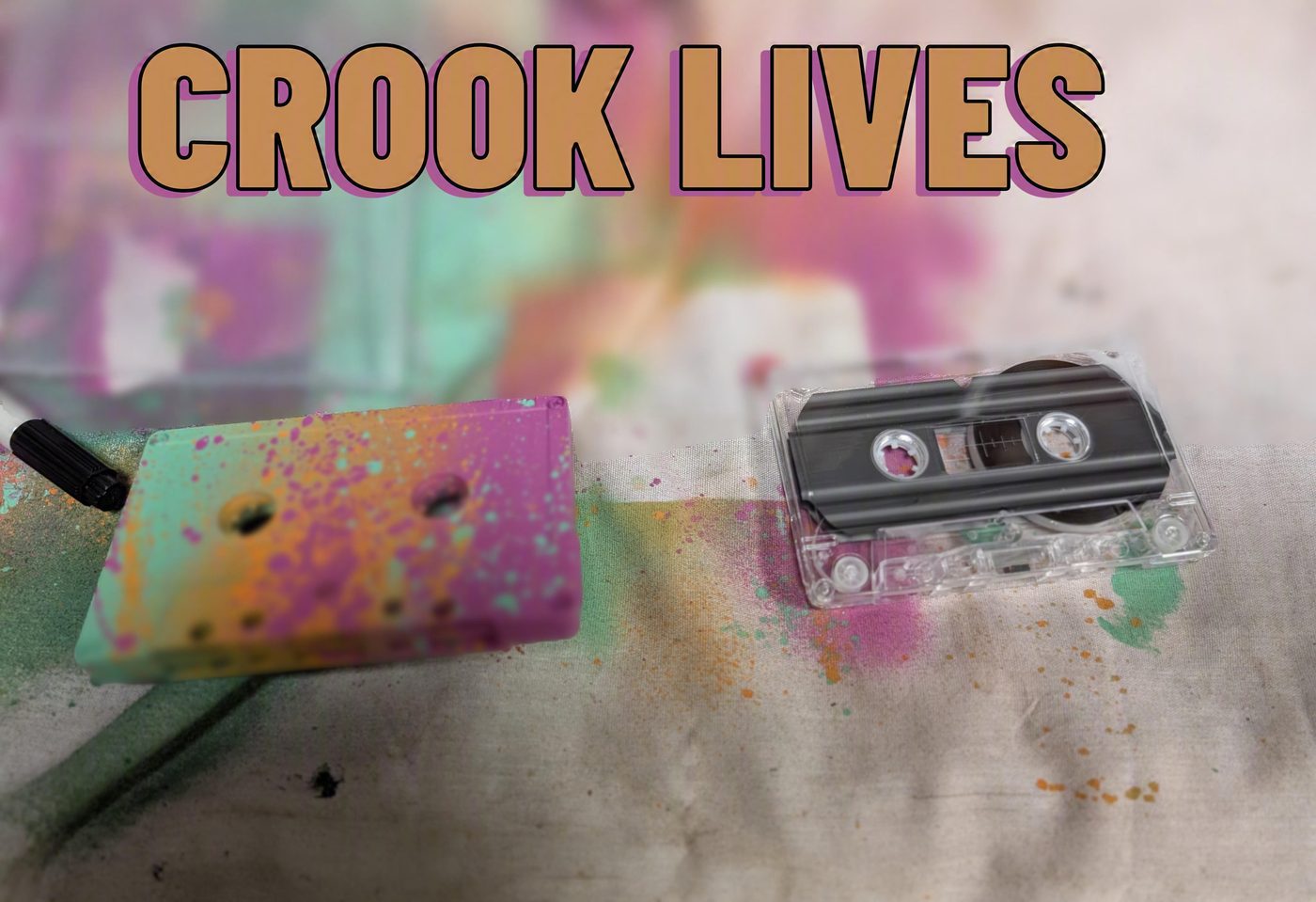 Crook Lives spray-painted cassette tapes