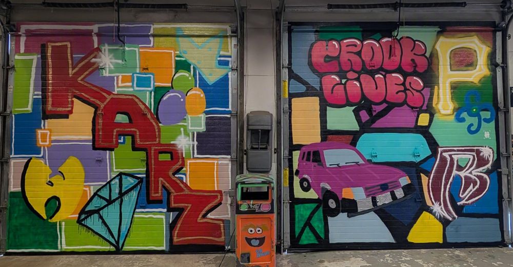 Crook Lives mural painted on a garage door